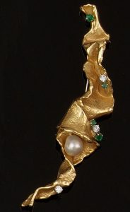 A diamond, emerald and cultured pearl brooch, by Gilbert Albert