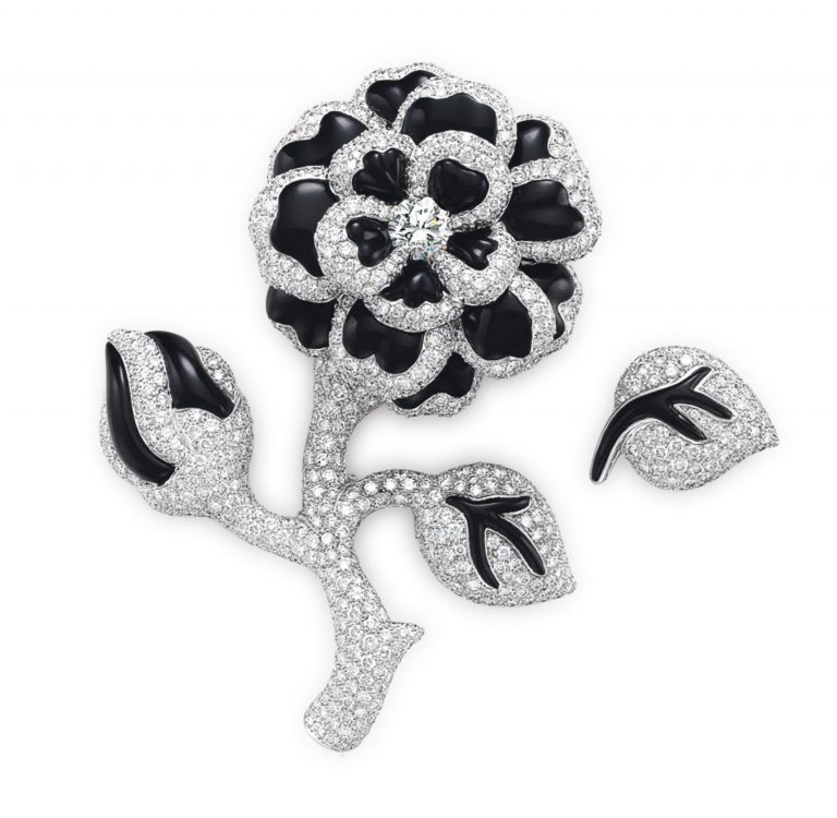 A DIAMOND AND ONYX FLOWER BROOCH AND LEAF PIN, BY CHANEL