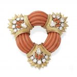 A coral and diamond brooch/pendant, by Kutchinsky