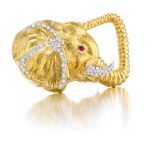 An 18k gold, diamond and ruby double clip brooch, David Webb