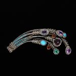 Aigrette, brilliant-cut diamonds, turquoises, an emerald and other coloured stones
