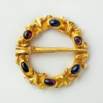 Ring Brooch, 1250–1300 British or French, Gold, sapphires and garnets