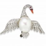 A CULTURED PEARL AND DIAMOND 'FLYING SWAN' BROOCH, BY VERDURA