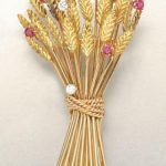 Gold, Ruby and Diamond Clip Brooch Signed Verdura