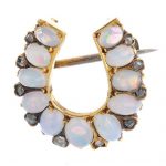 A late Victorian 15ct gold, opal and diamond horseshoe brooch