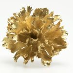 A gold carnation flower brooch, Meister